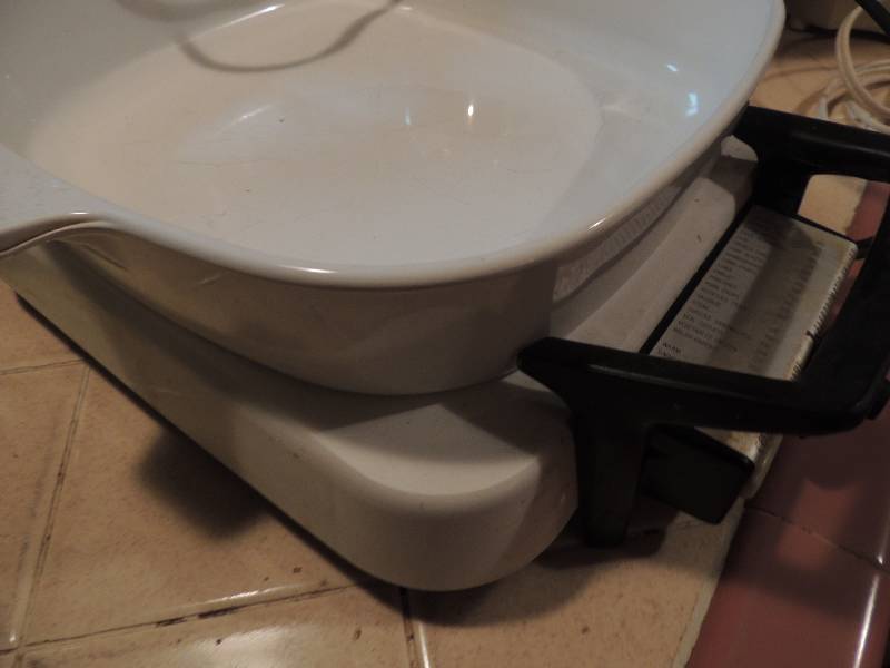 lot 250 image: Casserole with lid and hot plate