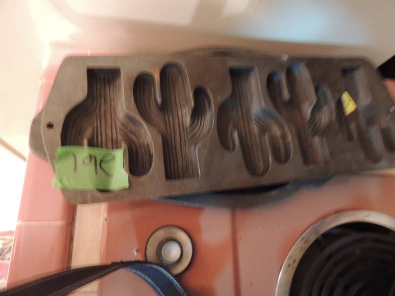 lot 261 image: Cast Iron cornbread  PANS peppers  AND  cactus