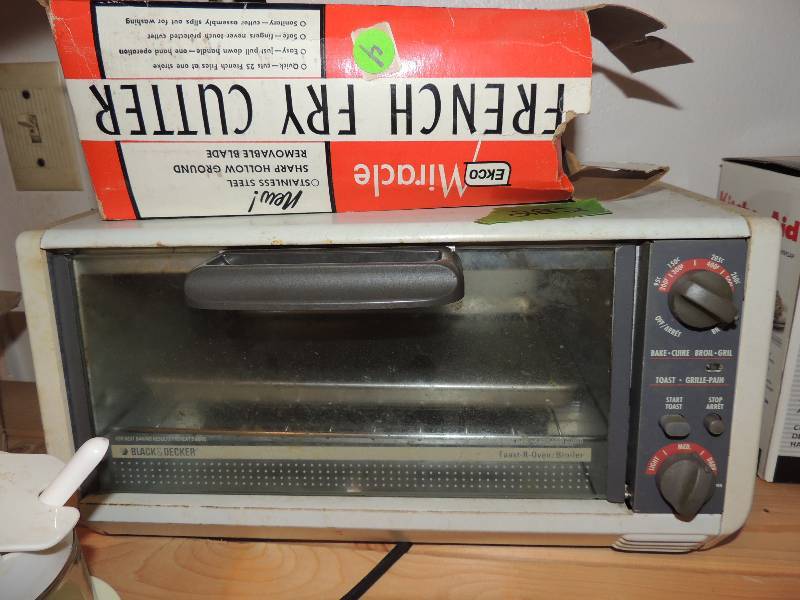 lot 282 image: Toaster over, french fry cutter in box and spice canisters with spoons in carrier