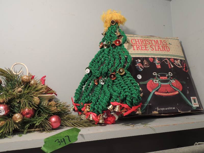 lot 347 image: Christmas tree stand, braided yarn Christmas tree with bells, Christmas candle centerpiece , fall wreath and Christmas candle