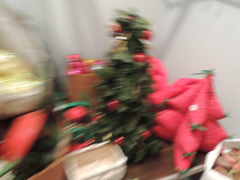 lot 349 image: Christmas- ornaments,  tree stand, basket, candy dish, train, 24 inch tree, plush tree 12 rolls of paper and multiple tree skirts