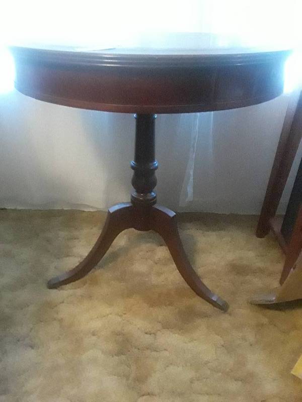 lot 3 image: Beautiful antique accent table with tripod pedistol leg, adorned with a leather top inlayed. Excellent condition that would hardly give notice to the age of the piece.