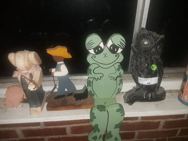 lot 60 image: Garden decorations - wooden woman bunny figurine walking pig, wooden man with cane walking dog figurine, frog shelf sitter, and black owl figurine
