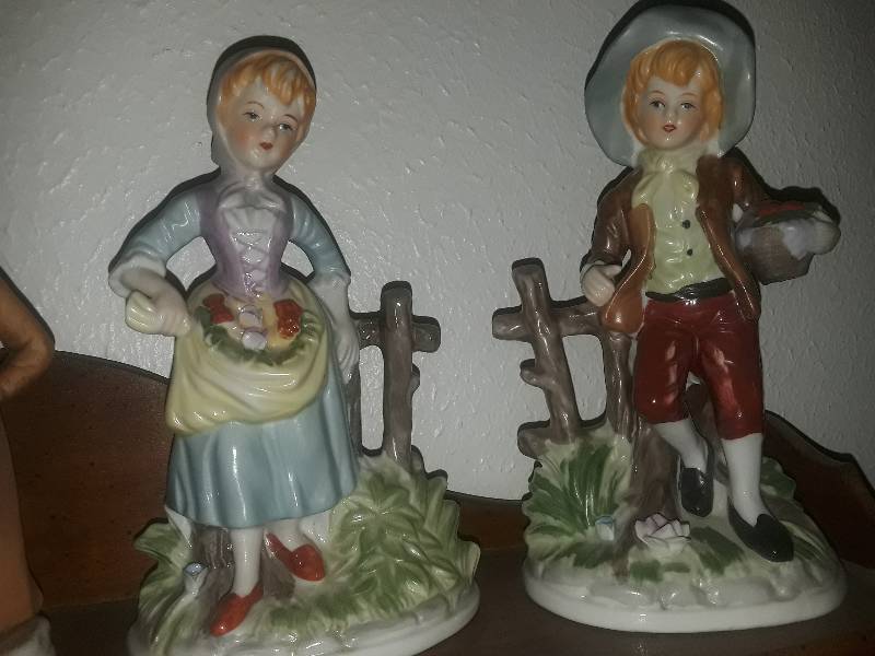 lot 310 image: Boy and Girl Porcelain dolls with fruit and vegetables