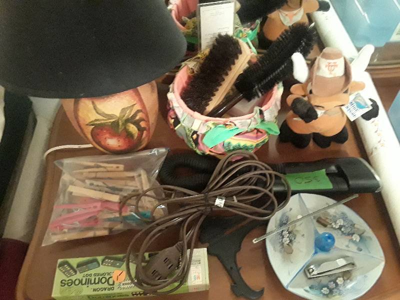 lot 350 image: Extension cords, jewlery bowl, hand held light, lint brush , hair brush, etc.