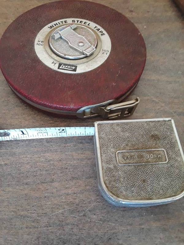 lot 769 image: 2 measuring tapes 30 ft. and 100 ft.