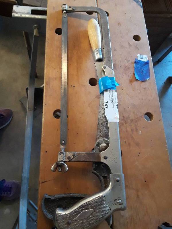 lot 747 image: 2 handsaws and serated knife