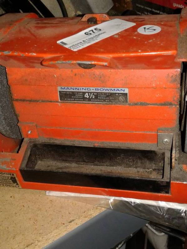lot 675 image: Vintage Manning-Bowman 715001 3.2 Amp 4-12 Bench Grinder McGraw Edison USA