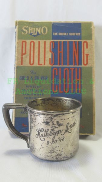 lot 18 image: Sterling silver cup (2.5 tall) and gold & silver polishing cloth