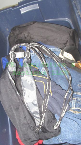 lot 63 image: Assorted clothes including Levis jeans and more, tote full