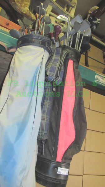 lot 72 image: Golf clubs and golf bags (3 bags total, each with clubs)