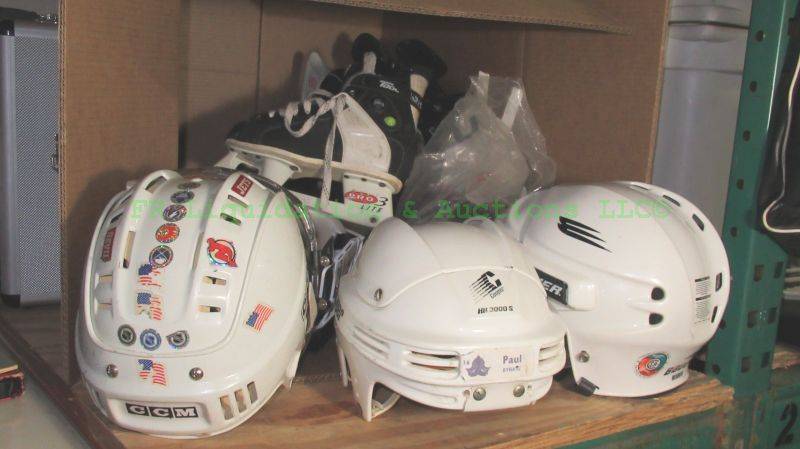 lot 106 image: Assorted youth hockey gear including helmets, skates plus
