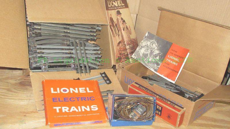 lot 117 image: Vintage mid century Lionel train track set with original manuals and accessories
