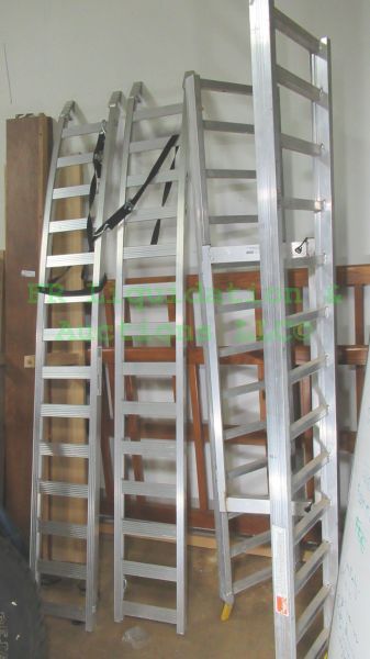 lot 126 image: Werner R402 arched aluminum ramp set and Outland sports 52765R aluminum ramp set. 2 sets total