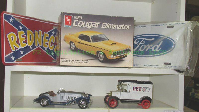 lot 246 image: AMT 1969 Cougar eliminator model kit, Ford license plate and more as shown