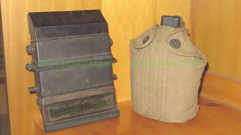 lot 217 image: World War 2 GI canteen and canvas cover, and WW2 Nazi tank periscope (marked with Nazi insignia)