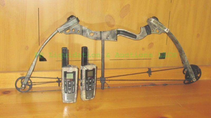 lot 211 image: Raptor compound camo hunting bow and camo walkie talkie set (no charge cord)