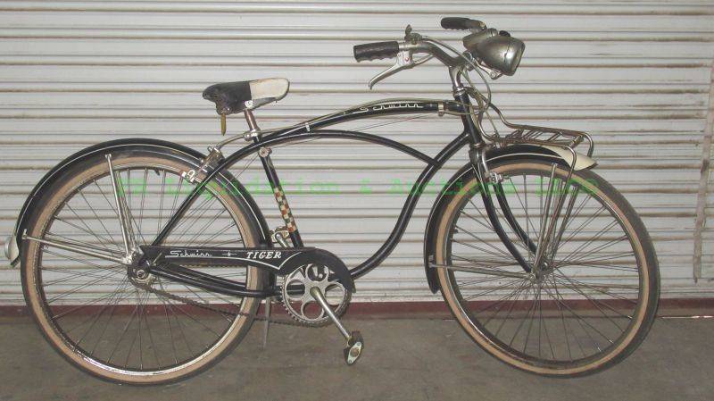 lot 186 image: Vintage 1959 Schwinn Tiger bicycle with attached accessories, in working condition