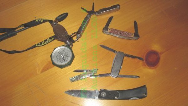 lot 213 image: Assorted pocket knives and multi tools including McCoy, Cabelas, and more