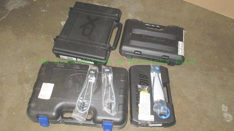 lot 196 image: Pistol hard carry cases (4) and trigger locks (4)