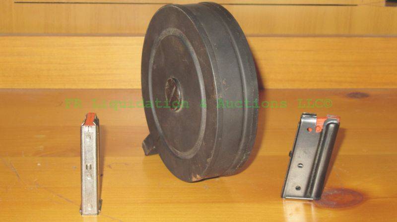 lot 300 image: .22 caliber 100 round drum and .22 magazines