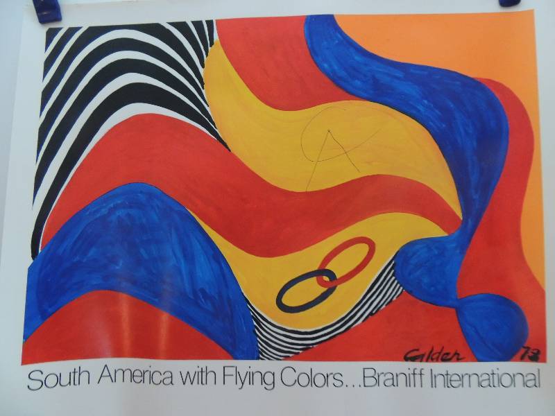 lot 181 image: Alexander Calder 1973 - South America with Flying Colors Braniff International 19x24.     Ports of Entry William S. Burroughs and the arts. Los Angeles County Museum of Art July 18- October 6 1996 28x18