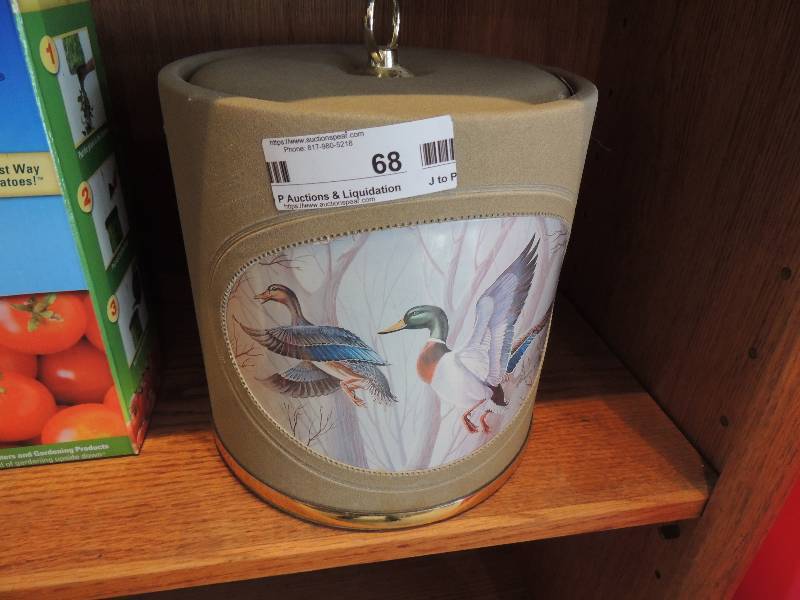 lot 68 image: Decorative duck ice bucket,  topsy turvy tomato planter