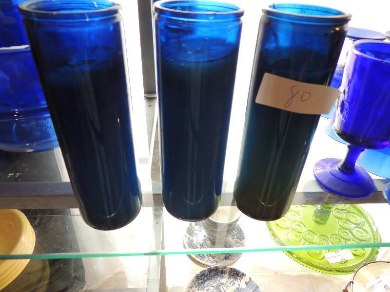lot 80 image: Cobalt Blue- 4 4 candle holder with candles