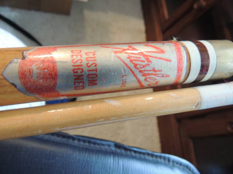 lot 125 image: Blue Pool Cue in bag, Black lather cue case with Hustler Line cue