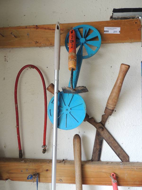 lot 211 image: Assorted shovel, duster, trimmer, hoe.