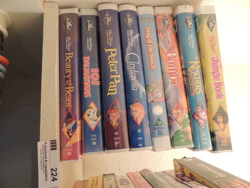 lot 224 image: 8 VHS Disney tapes and 62 other assorted VHS tapes