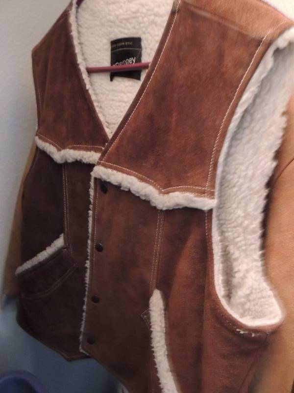 lot 226 image: Brown leather vest size 46 brown leather coat and woman leather poncho