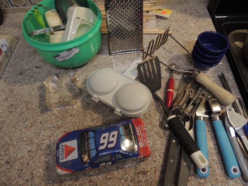 lot 166 image: Assorted kitchen utensils - GRATERS, COOKIE CUTTERS, EGG POACHER, AND MORE 