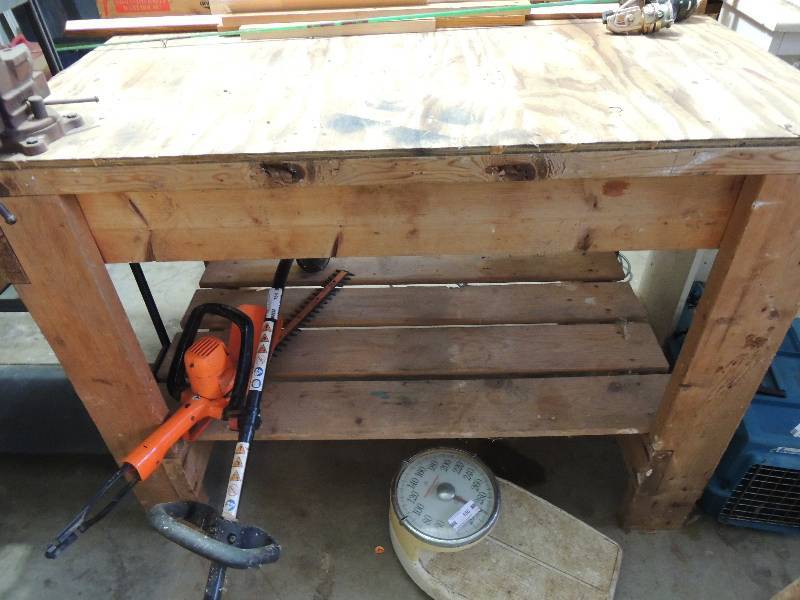 lot 181 image: 28 x 49 x 35 wood working bench with vice attached