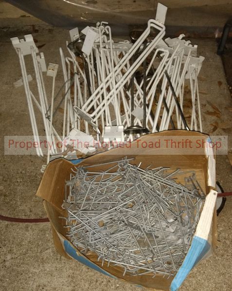 lot 58 image: Peg Board and slat wall  Hangers