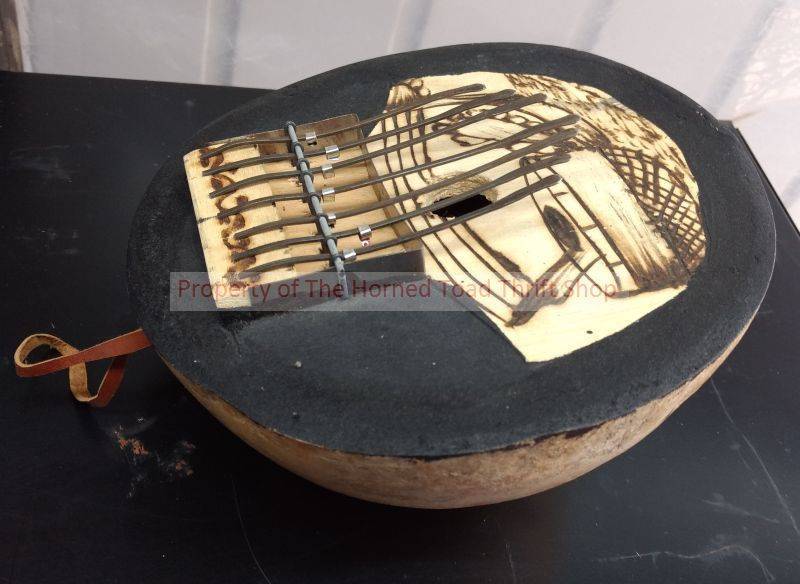 lot 102 image: Native Harp