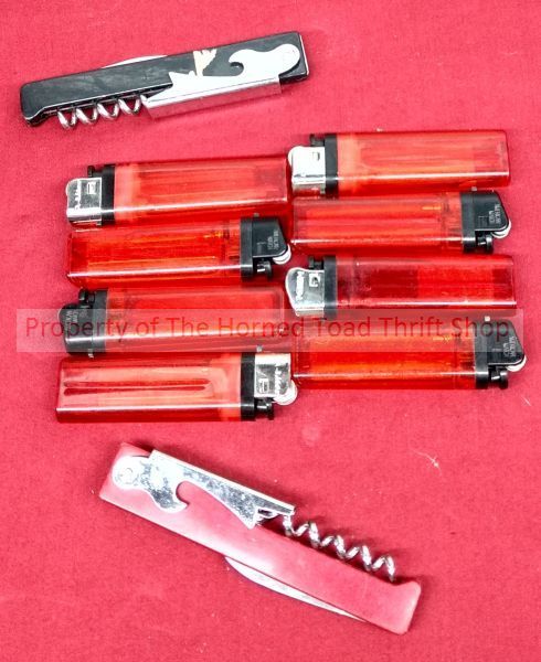 lot 199 image: Lighters and Cork Screws