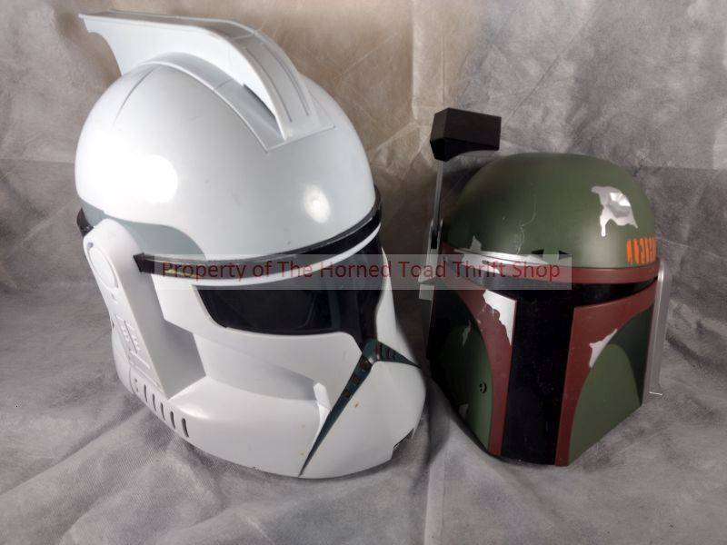 lot 294 image: Star Wars Stormtrooper Helmet & Star Wars Boba Fett Wall Display Helmet