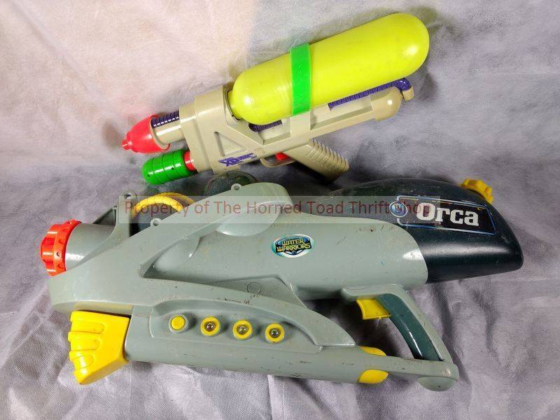 lot 298 image: (2) Water Guns Lamari Buzz Bee Toys