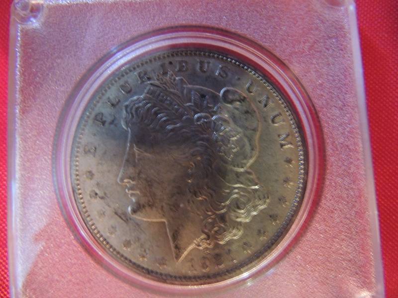 lot 1 image: Morgan Silver Dollar 1921 in hard case Very Nice
