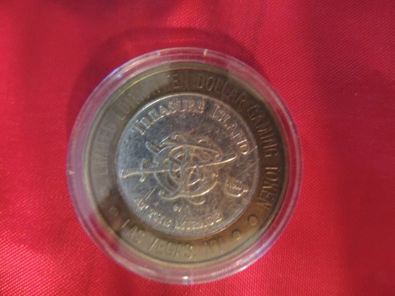 lot 3 image: Limited Edition TEN  Dollar Gaming Token Treasure Island  the Mirage Las Vegas .999 fine silver