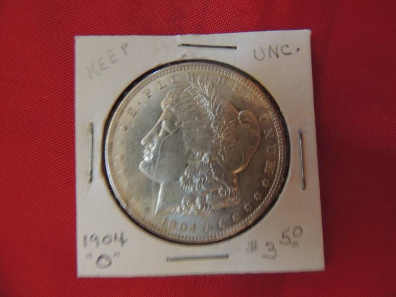 lot 11 image: Morgan Silver Dollar 1904 O BRILLIANT very nice