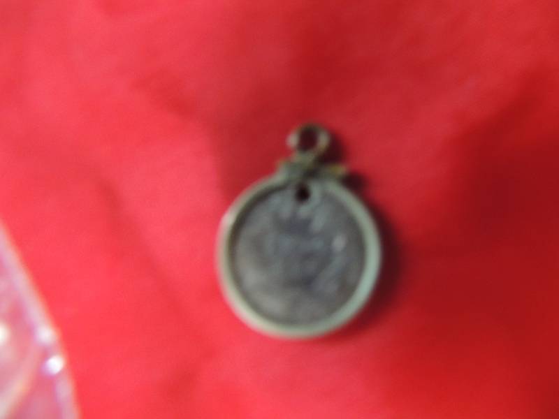 lot 24 image: Seated Liberty Dime 1890. made into charm ( see picture)