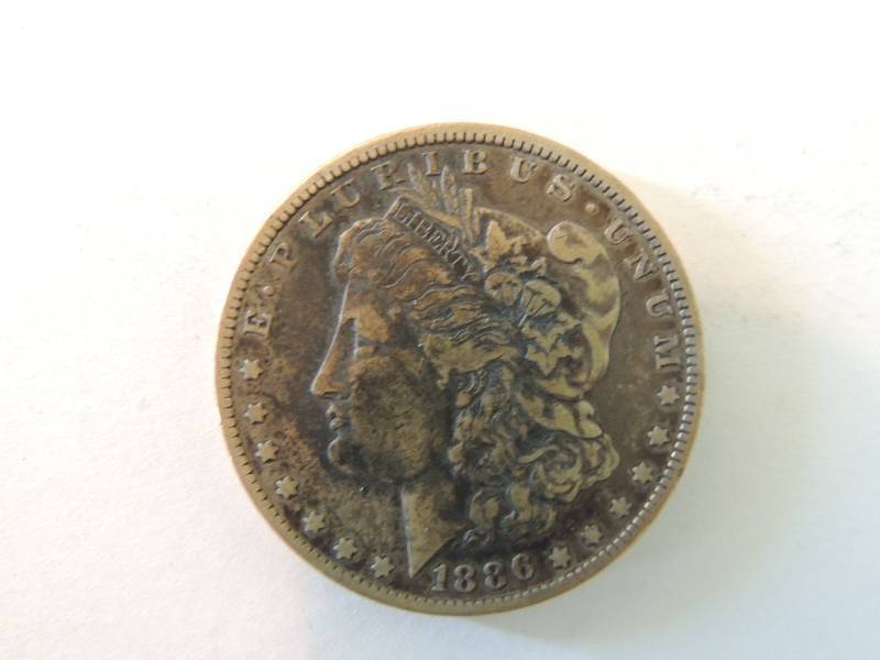 lot 56 image: Morgan Silver Dollar 1886