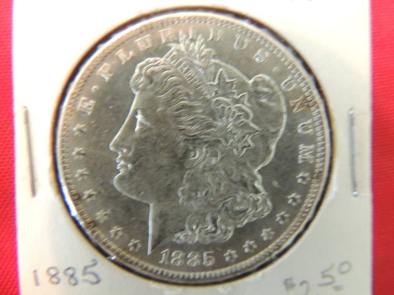 lot 57 image: Morgan Silver Dollar 1885 O BRILLIANT