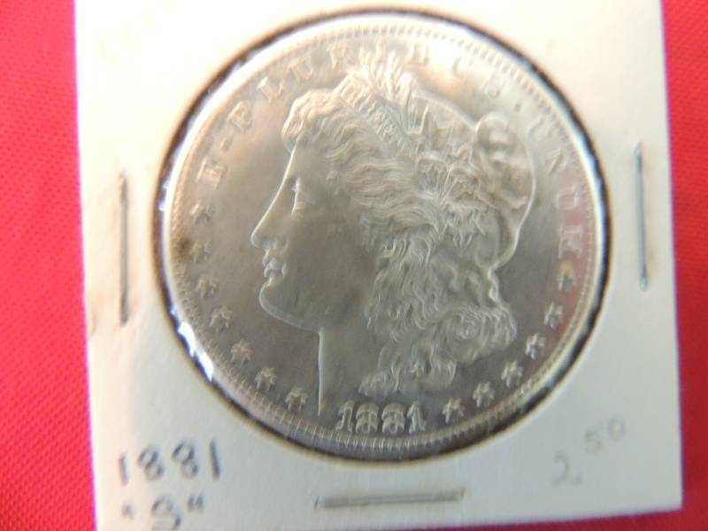lot 106 image: Morgan Silver Dollar 1881 S   BRILLIANT  clean luster