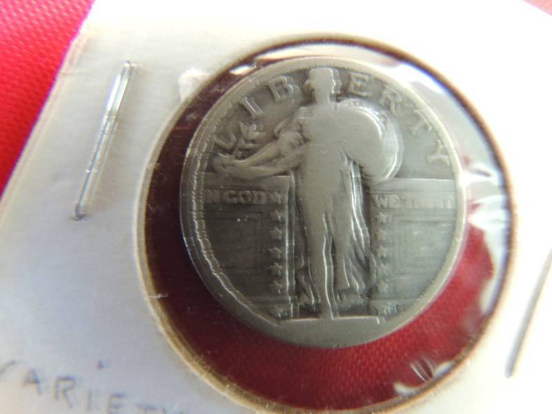 lot 109 image: Standing Liberty Silver quarter dollar . 13 stars showing with 3 under bird