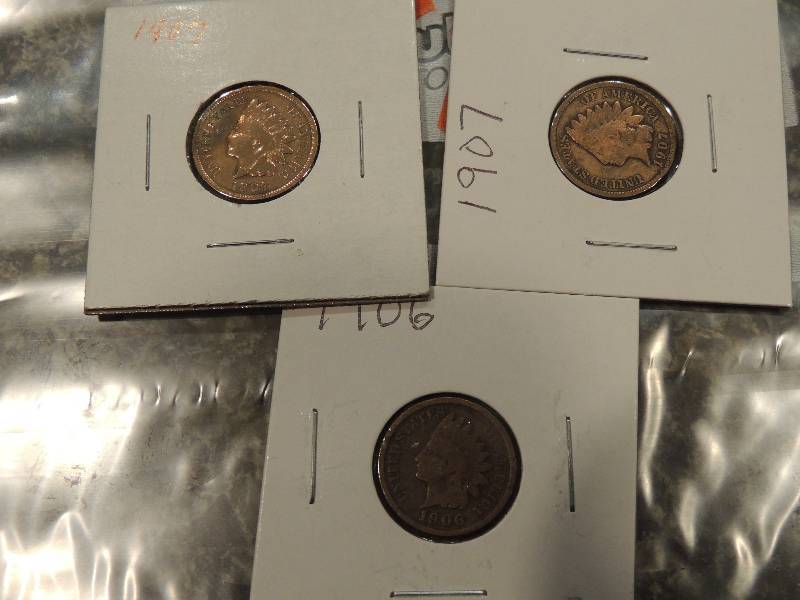 lot 212 image: Indian Head Pennies   1907, 1907, 1906 very bright, good detail crisp dates