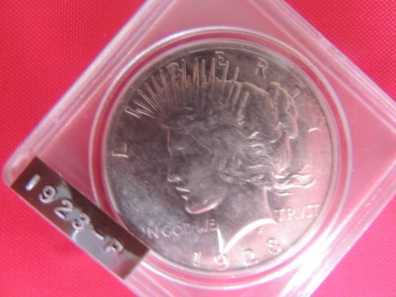 lot 126 image: Peace Silver dollar 1923 P in hard case BRILLIANT