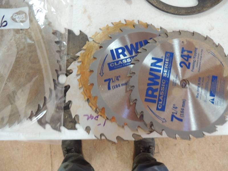 lot 26 image: 10 inch saw blade x 7 and 7 14 inch blade
